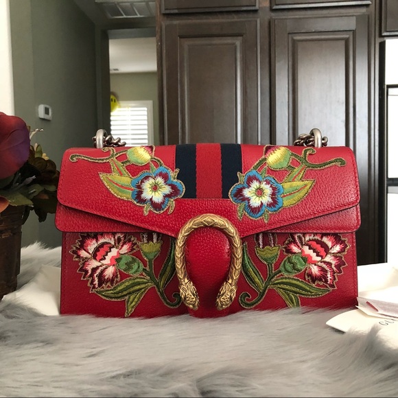 small red shoulder bag